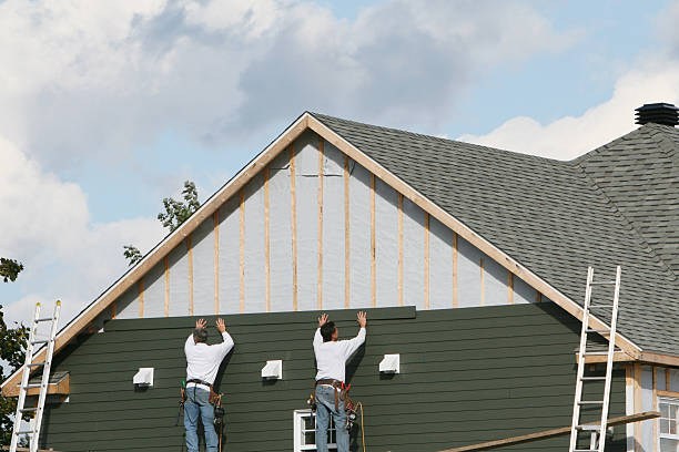 Professional Siding Installation technician working in Farmersville, OH